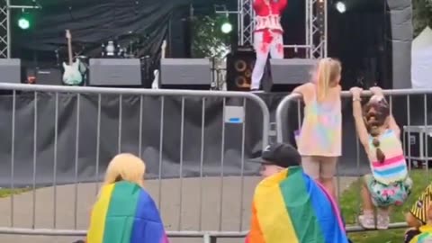 Drag queen dressed in blood throws tampons to children at pride festival in Norwich, England