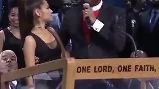 Bishop Charles H. Ellis III Places Hand Next To Ariana Grande