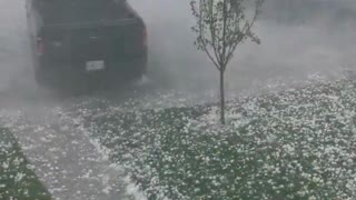Insane video of tennis ball sized hail in Calgary