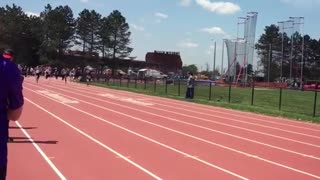 Student athletes run 100 m dash at a track meet