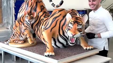 Chef makes detailed sculpture of chocolate tigers