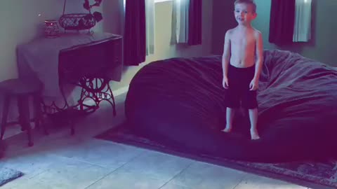 Boy flips when hit by exercise ball
