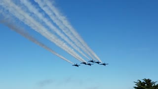 The Blue Angels Fly by the American Flag in San Francisco.