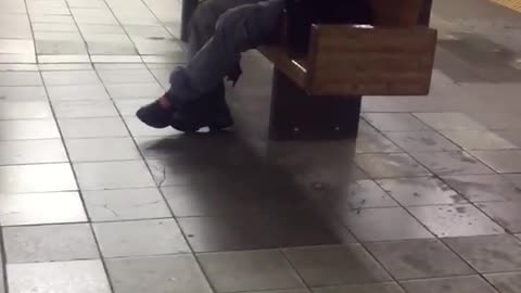 Nsfw man masturbates in a subway station with rat running in background