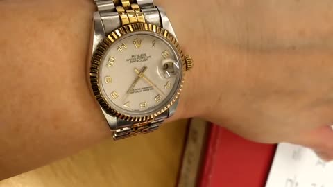 Lady showing off her ROLEX Oyster Watch