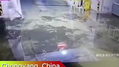 Water flooded the underground parking lot during the flash flood in Chongyang, China.