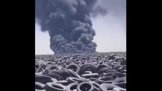 Huge tire graveyard on fire in Kuwait