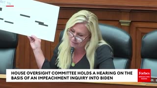 At today's House Oversight Committee hearing, Rep. Marjorie Taylor Greene (R-GA) clashed with Democrats over her visual aids to attack Hunter Biden.