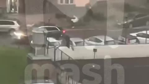 Babushka Decked by Flying Debris During Storm