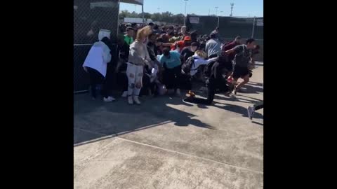 Fans rushed the entrance gates at rap star Travis Scott's Astroworld festival in Houston