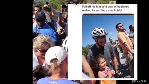 Biden distracted by young girl .... crashes his bike.