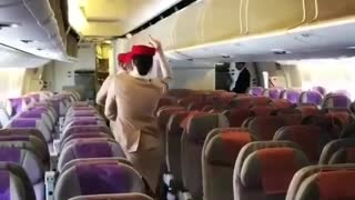 Flight Attendants Have Fun By Dancing On Empty Airplane