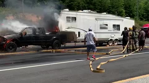 Truck Engulfed in Flames Rolls into Fire Truck