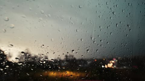 The sound of rain and thunderstorms on glass