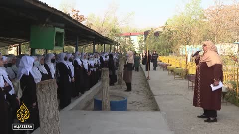 Afghan girls sit exams despite not attending schools for a year