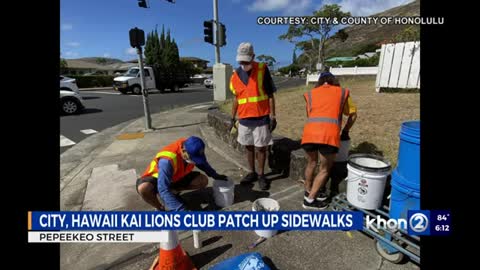 Hawaii Kai Lions Club patches up pothole ridden street