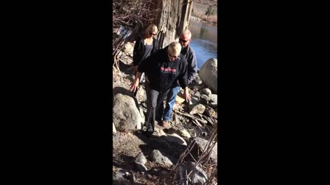 Collab copyright protection - black sweater rope swing over river
