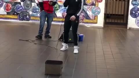 Two guys rapping about grilled cheese in subway