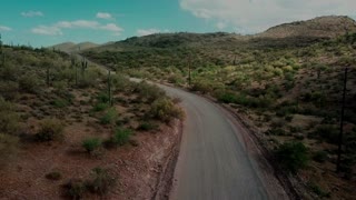 Drone captured unbelievable footage of reverse driving in desert road