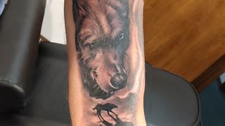 Shoulder tattoo bear wolf raven