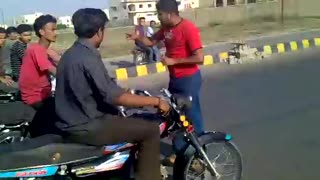 Bike riding by Karachi boys