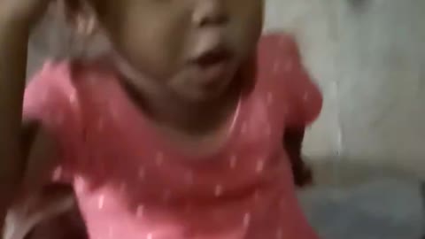 this little girl imitates monkey style
