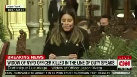 Wife of Slain NYPD Officer Calls Out DA, Gets Standing Ovation