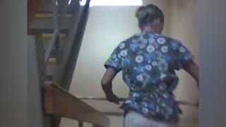 Bored Nurse Tries To Ride Broomstick Down Stairwell