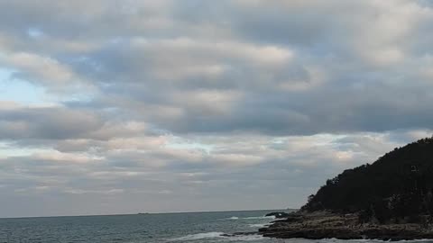 The windy horizon along the Busan Beach.