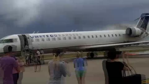 United Plane Catches Fire on Tarmac