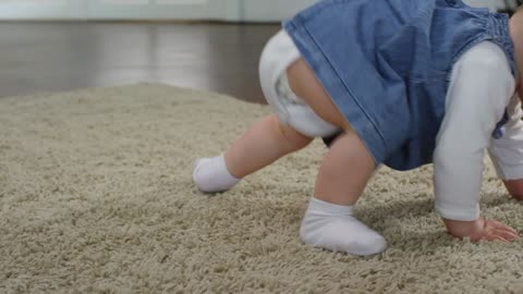 the clip of a little girl learning to walk with her feet, it's amazing