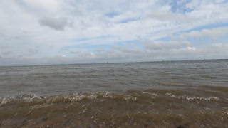 Waves crashing to the shore