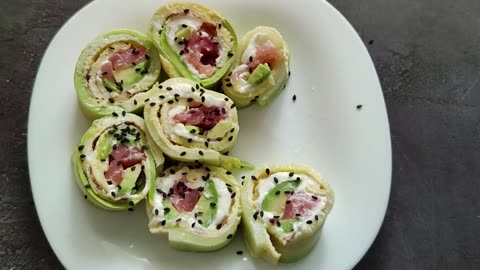 Culinary masterpiece: Zucchini, salmon, avocado and cream cheese rolls