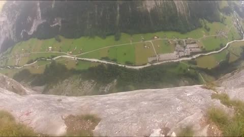BASE Jumper survives cliff strike in Switzerland