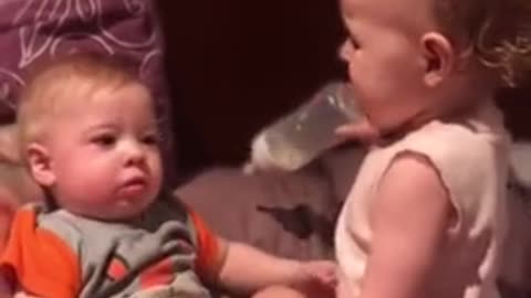 Toddler hilariously attempts to bottle feed baby brother hhhhhhh funny