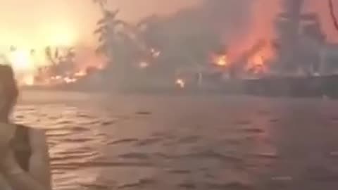 People Heading into the Water to Escape Wildfires in Maui