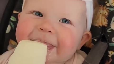 Baby eating ice cream for the first time. 🤗