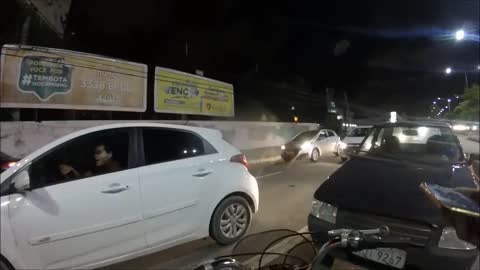 Cyclist Stops a Car from Crossing Over Bike Path