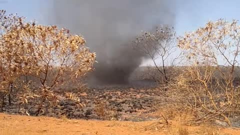 Guy Was Driving His Car Down a Dirt Road Close to a Dust Devil Then Stopped to Monitor It