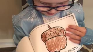 Lili reading for the first time