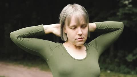 Woman in Green Bodysuit