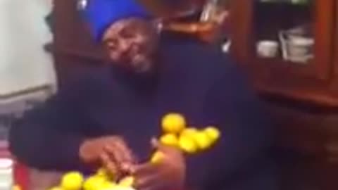 Family Covers Sleeping Man In Oranges For Practical Joke