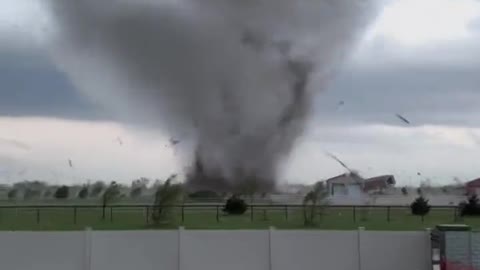 Man continues to film Andover Tornado right up until it swallows his yard