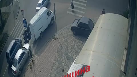 Russian military truck drives through the red light, runs over a civilian