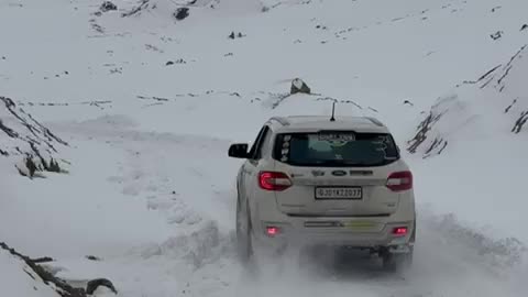 Car Riding on Snow