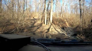 Jeep xj's offroading in the mud