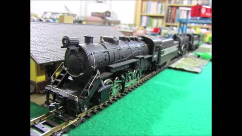 2 TYCO Chattanooga 2-8-0's haul 20 box cars