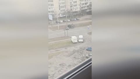 A RUSSIAN TANK IN KHARKIV CRUSHED A CAR