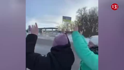 Jubilant Ukrainians welcome the soldiers returning from captivity