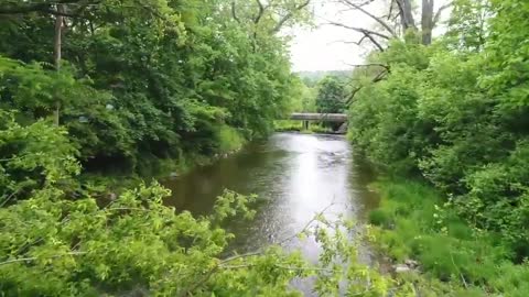 Drone Flying Over Calm Waters